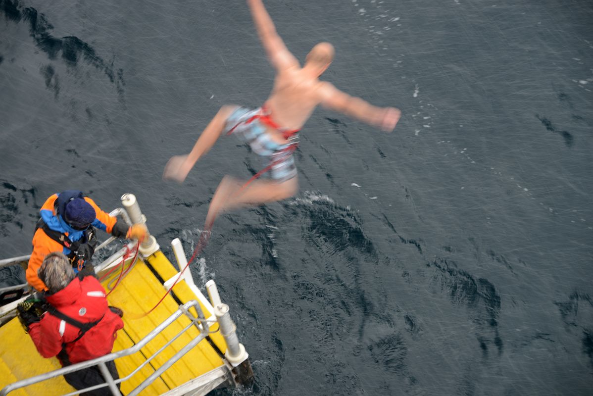 06B Tourist Taking The Polar Plunge In Foyn Harbour On Quark Expeditions Antarctica Cruise